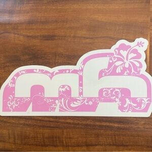 Pink and white “mh” sticker